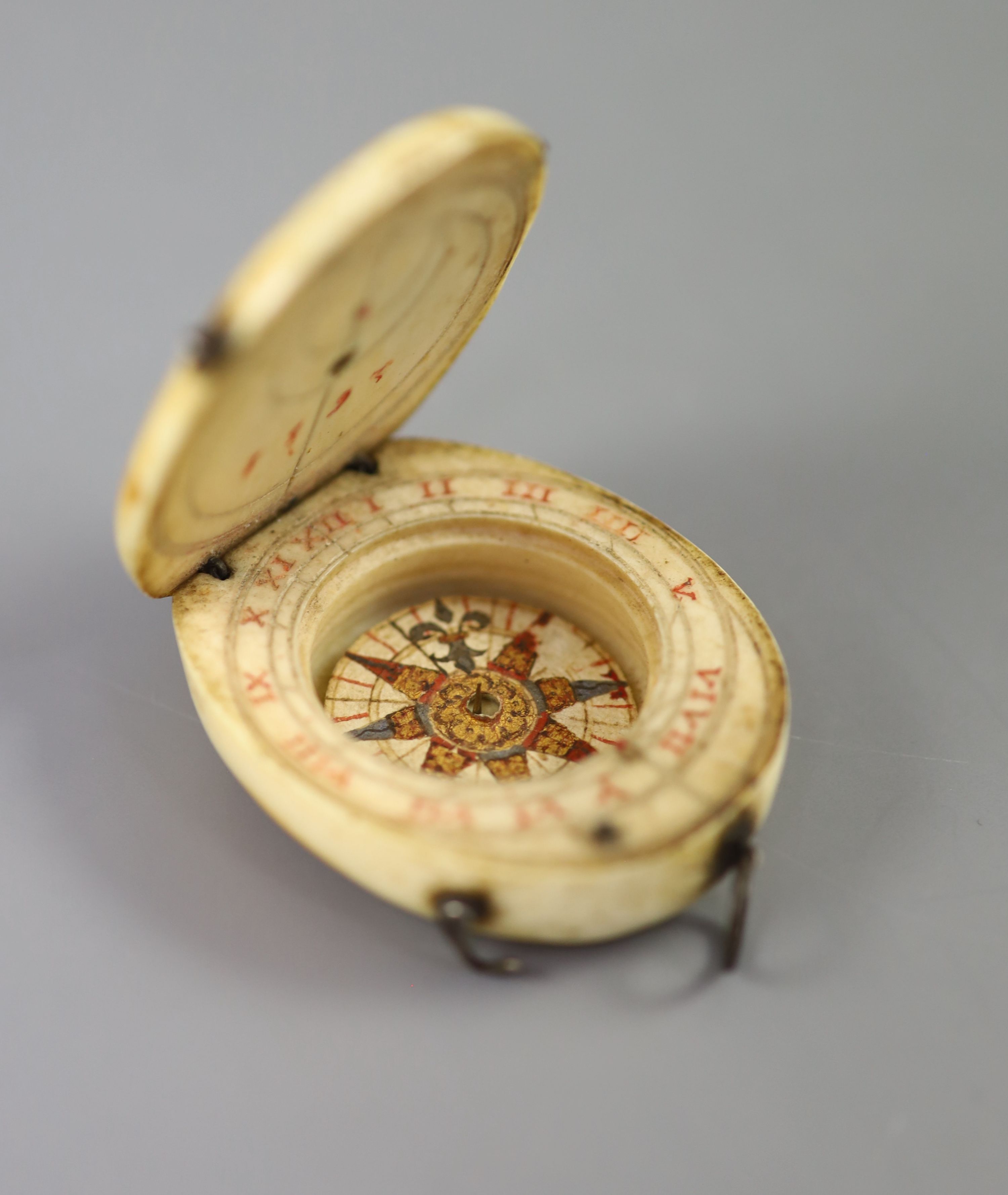 A rare late 16th century German oval ivory diptych-dial, width 39mm depth 48mm length 48mm